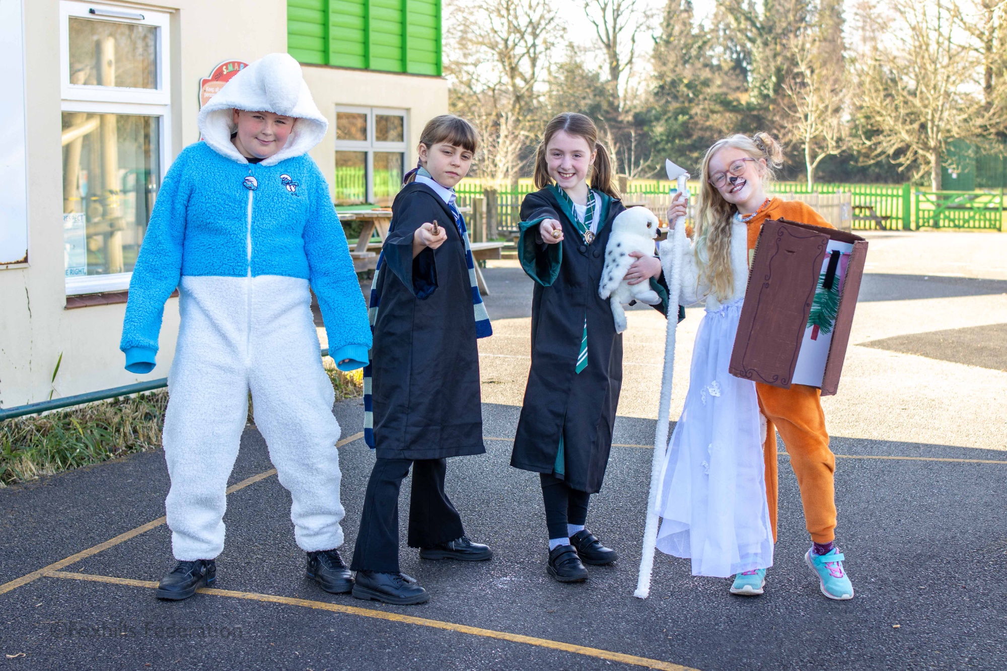 Children pose in outifts for World Book Day