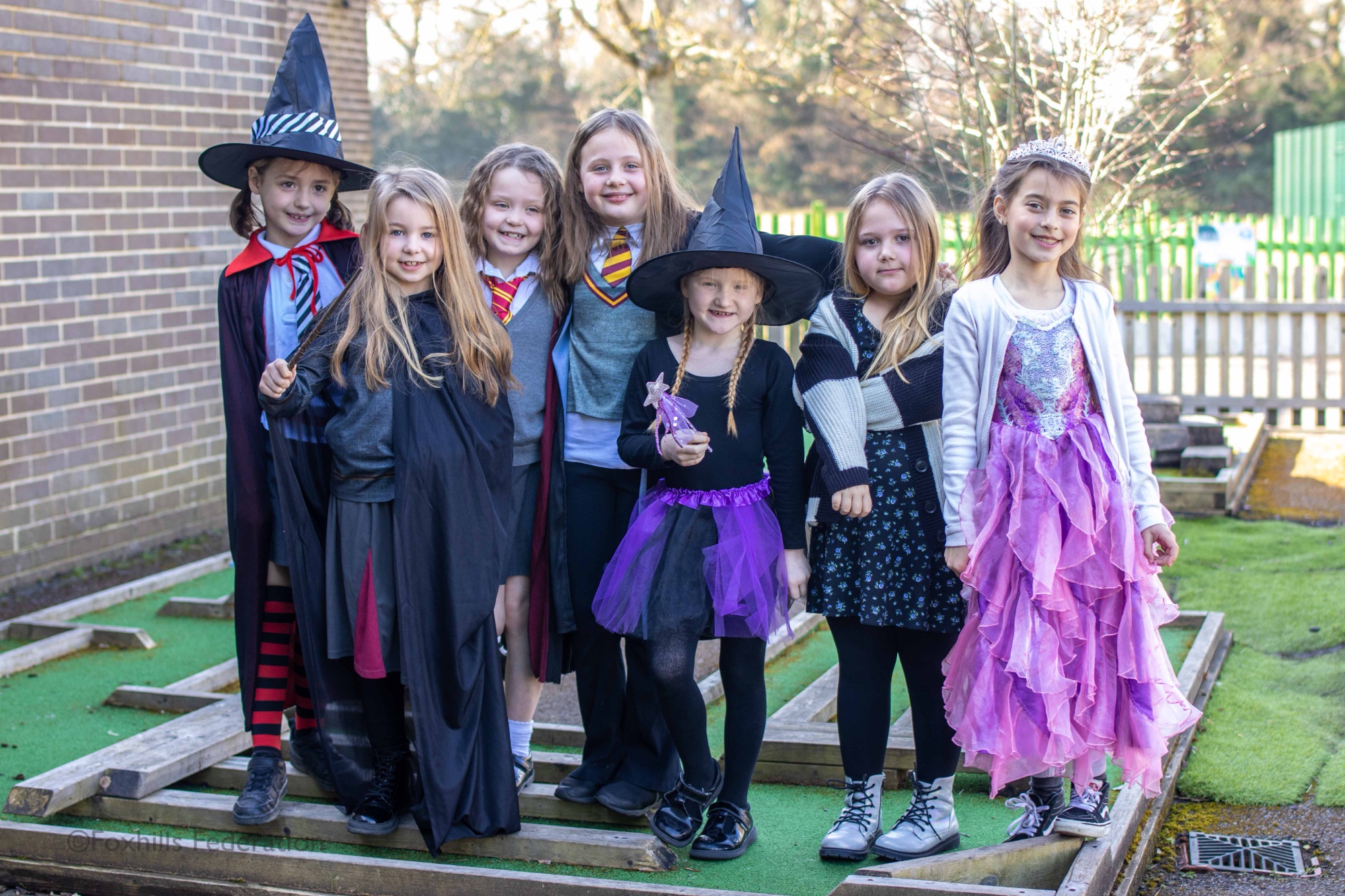 Children pose in outifts for World Book Day