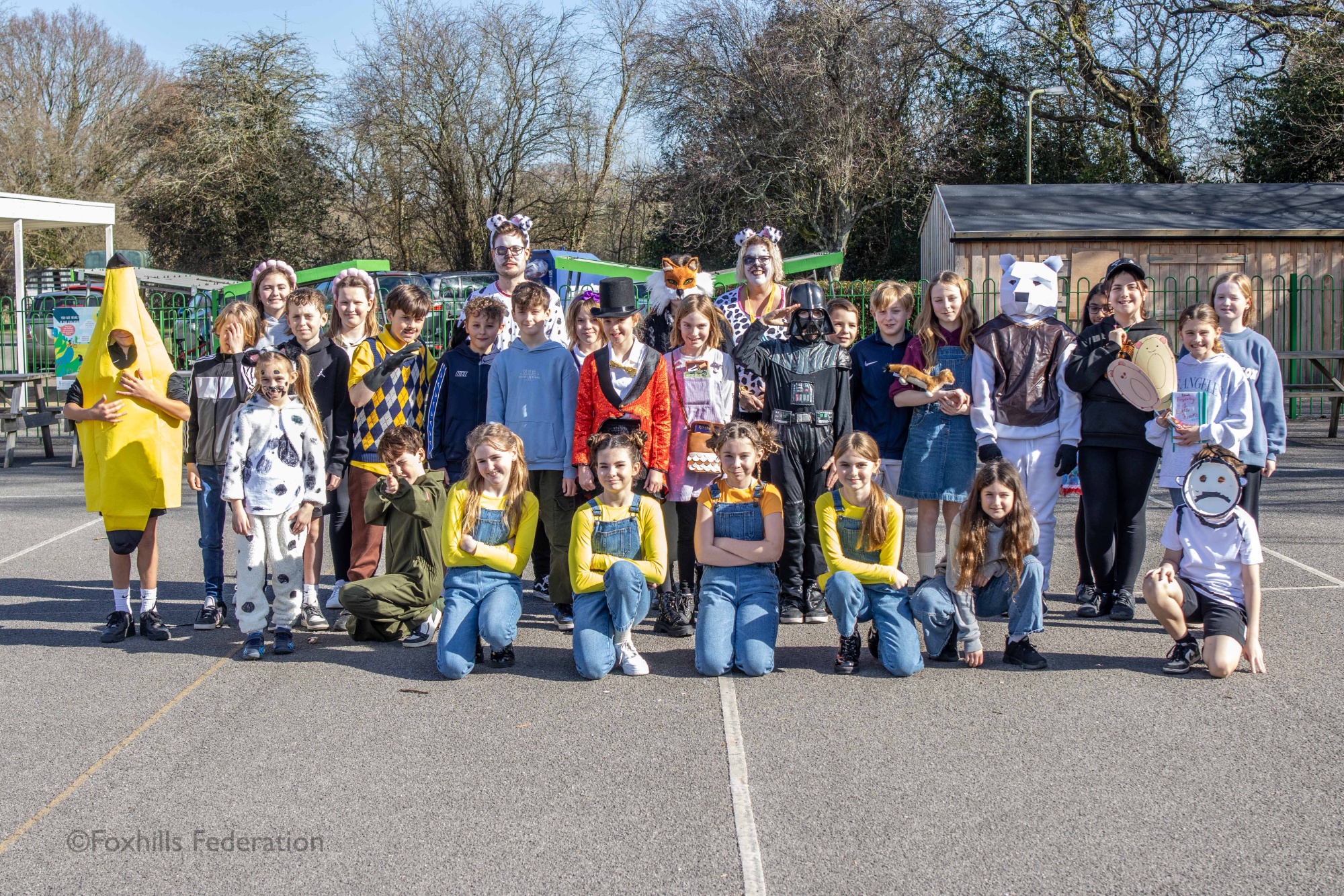 Children pose in outifts for World Book Day